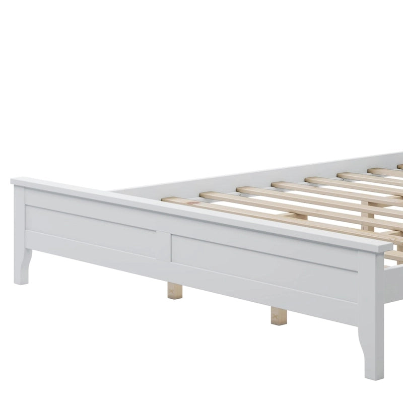 Letto a piattaforma in legno massello con testiera