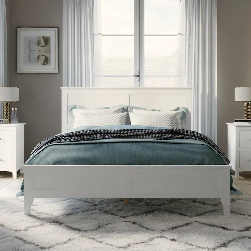 Letto a piattaforma in legno massello con testiera