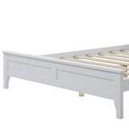 Letto a piattaforma in legno massello con testiera