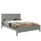 Letto a piattaforma in legno massello con testiera