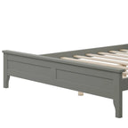 Letto a piattaforma in legno massello con testiera